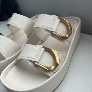 Dolce Vita White Sandals with Gold Buckles